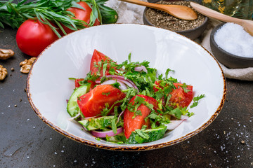 Vegetable salad with tomatoes and cucumbers