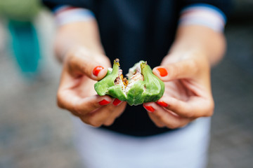 figs in the hands of a girl