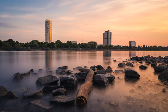 Long Exposure of the Skyscrapers of Bonn City at sunset and the river Rhine