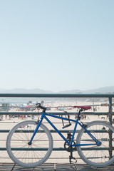 Vintage bicycle in a beach pier in California - 212635515