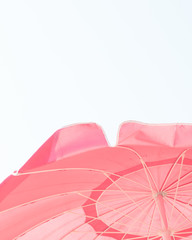 Vintage colorful beach parasol or umbrella