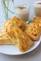 Puffs with cottage cheese served with coffee