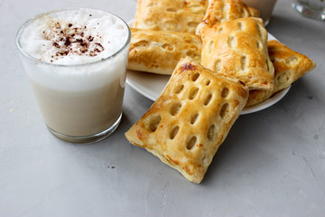 Puffs with cottage cheese served with coffee