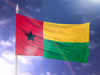 Flag of Guinea-Bissau with flare and dark blue sky