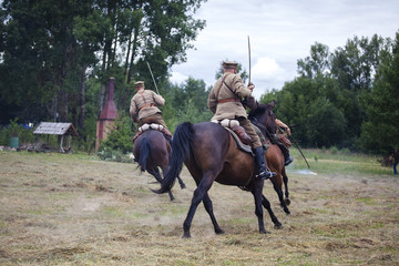 Polish cavalry are riding horses. Polish cavalry shows