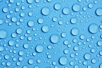 drops water on blue background