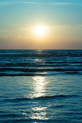 Sunset over the sea. Photograph from the beach.