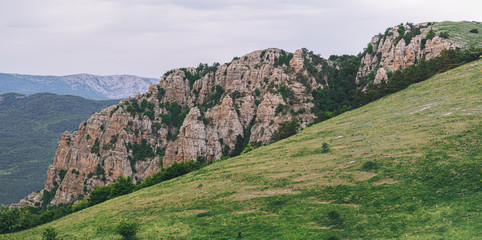 Mountains of the crimea and the green forest and village