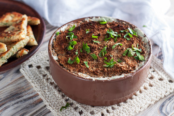 Hot spicy dip with jalapenos, cheese and herbs