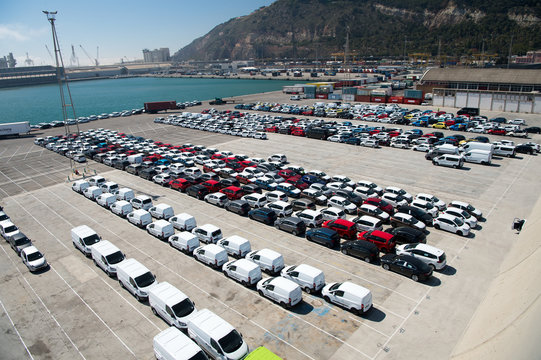  Rows Of Cars On Parking In Sea Port. Car Export And Import Business. Car Shipment. Shipping Activity. Trade And Car Commerce