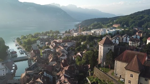 Annecy castle and old city aerial panoramic drone view, France