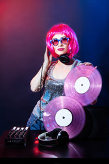 Portrait dj headphone vinyl disk beach plays equipment summer disco girl party retro vintage pink...