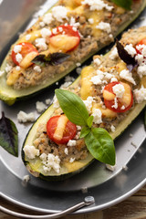 Zucchini boat filled with ground beef, mushroom, tomato sauce and parmesan cheese.