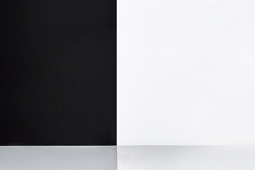 Black and white divided wall. Background. Copy space
