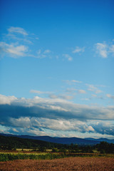 sky, landscape, clouds, nature, blue, cloud, summer, mountain, grass, green, field, hill, day, meadow, white, cloudy, cloudscape, beautiful, countryside, panorama, view, trees, tree, rural, forest