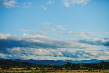 landscape, sky, nature, mountain, clouds, grass, mountains, blue, green, summer, hill, cloud, forest, view, tree, hills, beautiful, field, meadow, lake, rural, countryside, travel, water, panorama
