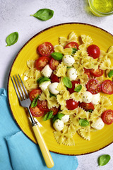Pasta caprese - traditional dish of italian cuisine.Top view.