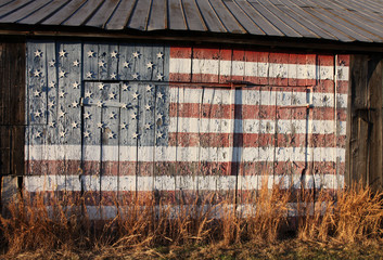 American flag painted on side of old Southern Maryland tobacco barn and dedicated to US Troops © Ralph