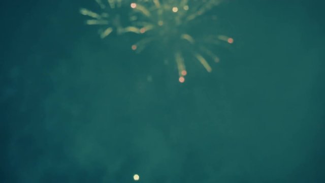fireworks display in the night sky out of focus effect abstract shot