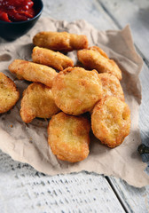 Chicken nuggets studio shot © Piotr Krzeslak