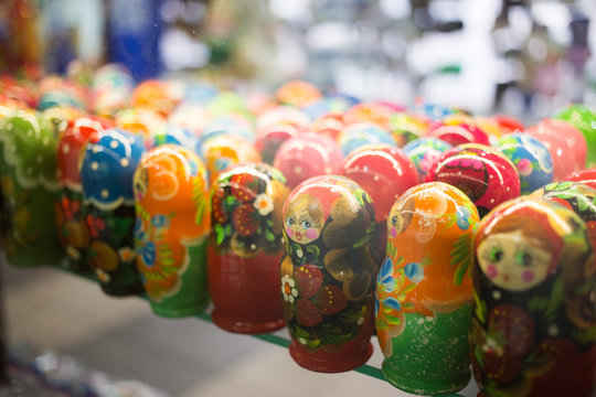 Moscow, Russia - 07 09 2018: a stall selling traditional Russian gifts, nesting dolls, spoons, glass bowls in a shop window.