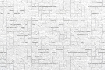 Modern white stone tile wall pattern and background