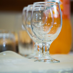 Empty glasses at the bar
