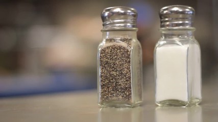 War on Salt. A lonely salt and pepper shaker sit on a counter.