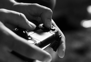 Hands playing video game