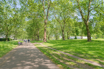 Constitution Hill road, in Green Park, at the Buckingham Palace Gardens, in central London, UK.