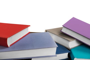 Assorted colorful hardcover books