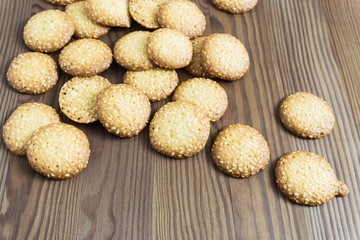 sweet sesame biscuits on a wooden table