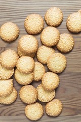 sweet sesame biscuits on a wooden table