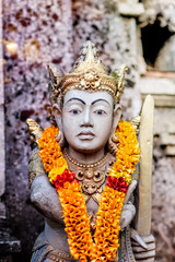 Traditional balinese stone carved statue.