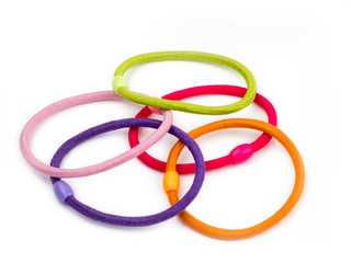 Colorful hair bands on white background.