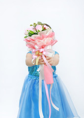 Little Asian child girl with Bouquet of roses for Valentine festival isolated on white background.