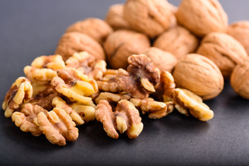 Fresh walnuts on a dark background 