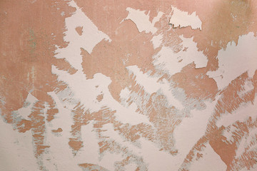 The texture of the plaster, as in unfinished repairs.