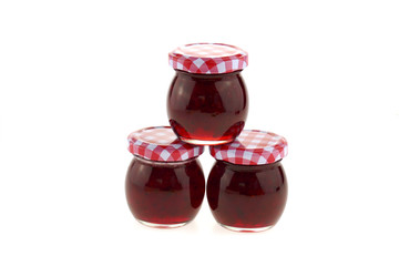 red currant jam isolated on a white background.Berry season. Currant crop