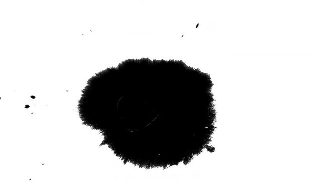 Drawing with Korean black ink spreading over traditional Korean paper