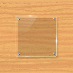 Transparent glass plate mock up. Yellow wooden background. Decorative graphic design element. Plastic glossy panel with reflection, shadow.