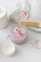 Fototapeta na wymiar Light-pink cream for hair treatment