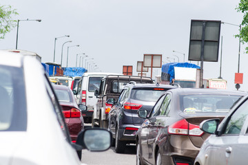 Cars on the road in traffic jam. Traffic situation in the Mumbai city. Pollution situation in...