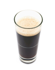 Glass of dark beer isolated