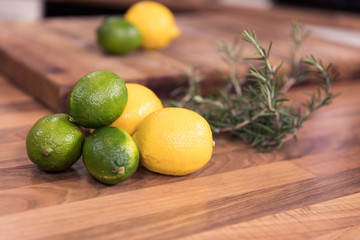 Lime and lemons on counter top.