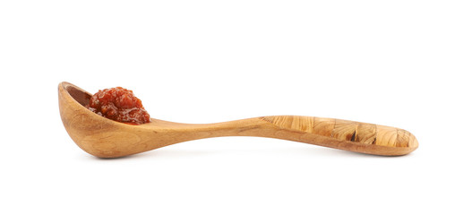 Wooden spoon of marinara sauce isolated