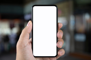 man hand holding phone with isolated screen on background city