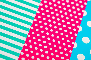 Obraz premium Colorful Papers Combined in Irregular Geometric Shapes