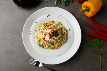 Pasta carbonara and poach egg and chicken flat lay view