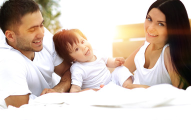 A young family with young children to bed in the bedroom